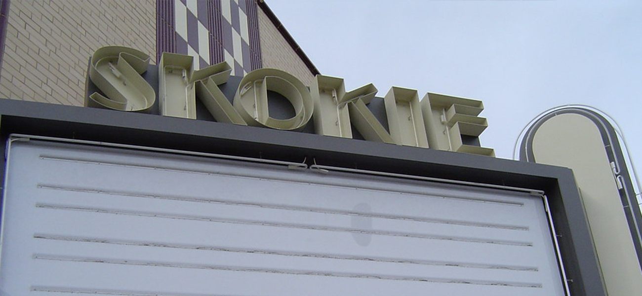 Sign saying Skokie on outside of building