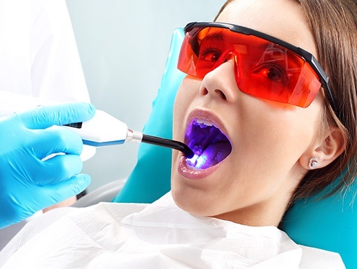 girl getting dental sealant