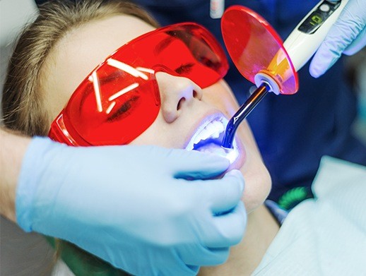 woman getting cosmetic dental bonding