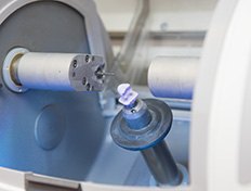 Block of ceramic inside CEREC milling machine