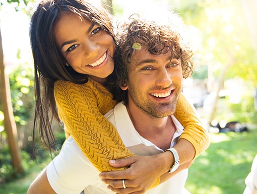 couple of smiling with veneers in Skokie