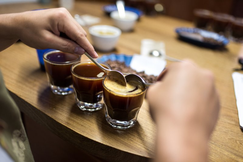 Three coffee cups in a row for tasting