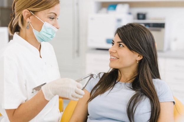 patient speaking to dentist about cosmetic dentistry