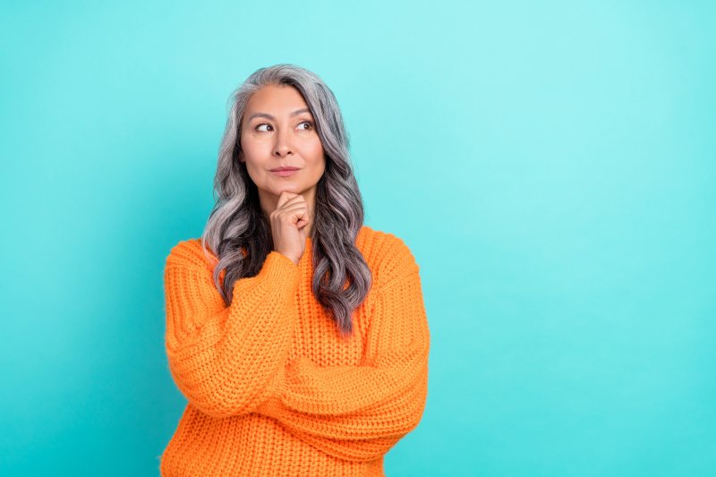 Woman has curious expression.