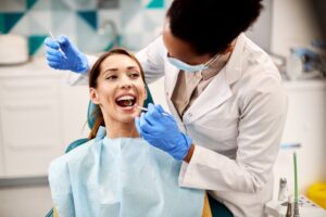 Patient being examined by dentist.